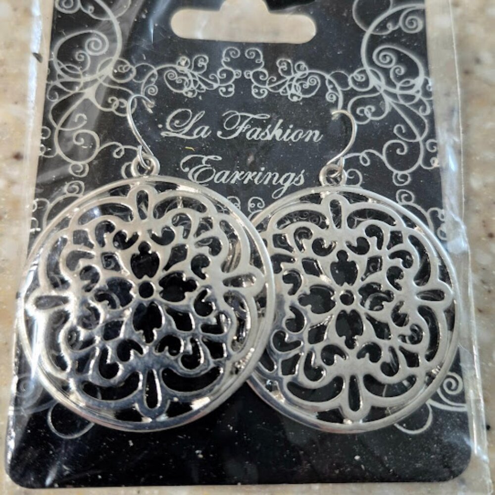 Silverstone drop earrings. Beautiful scroll design.